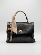 The Anya Glossy Flap Crossbody.