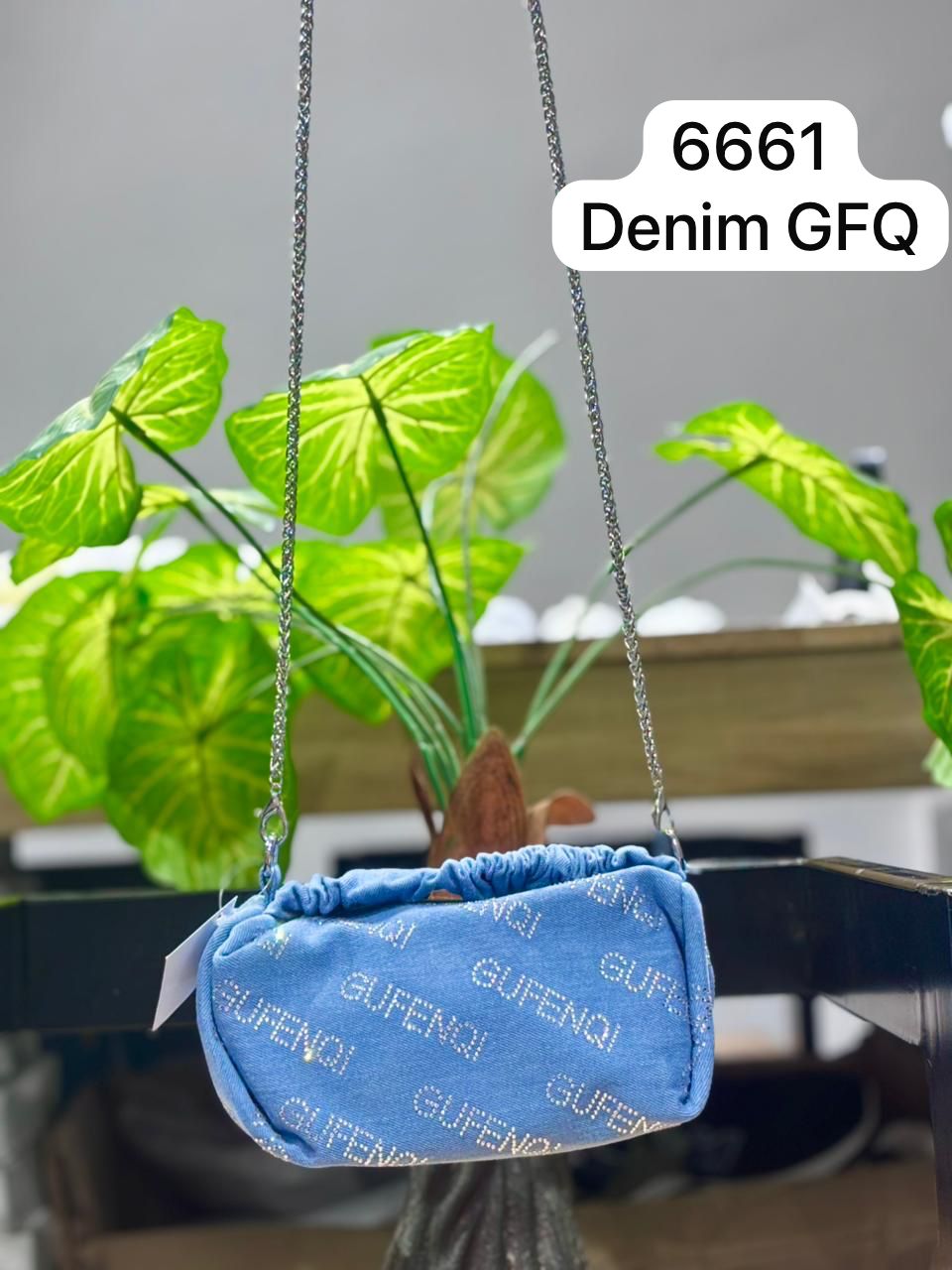 The Skye Gathered Denim Pouch.