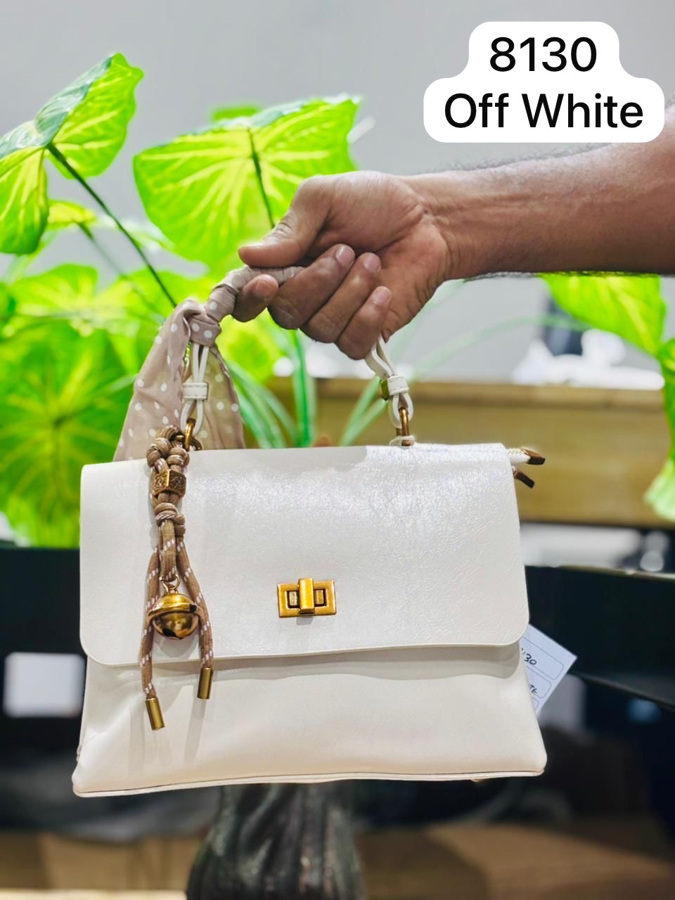 The Anya Glossy Flap Crossbody.