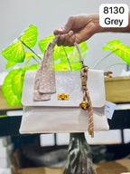 The Anya Glossy Flap Crossbody.