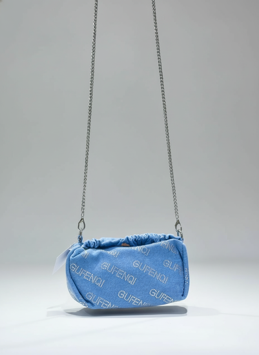 The Skye Gathered Denim Pouch.
